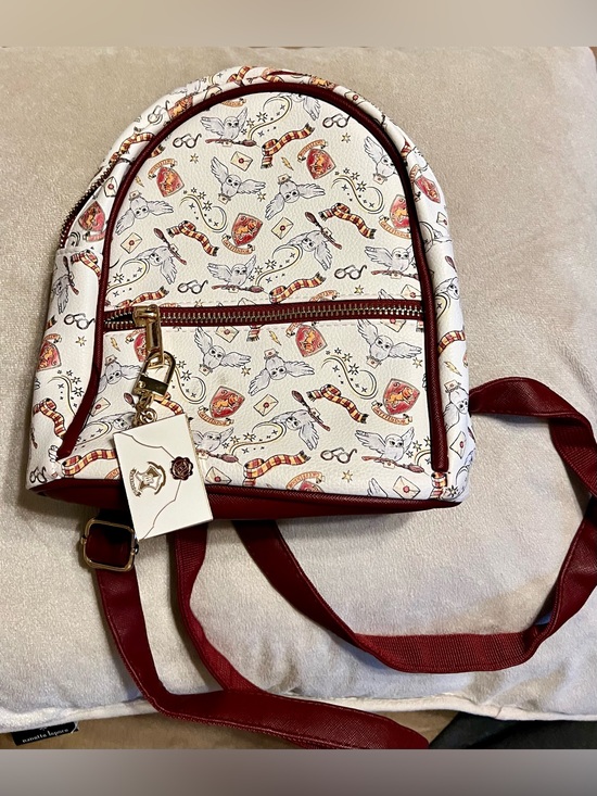 Wizarding World Of Harry Potter Handbags - Harry Potter Gryffindor Mini Backpack Hogwarts Crest Front Zip Pocket